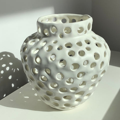 Holey Vase, porcelain sculpture by artist Julie Jung. Included in the exhibition, REUNION (Once Upon a Time in Philadelphia), at Cerulean Arts February 26 - March 24, 2025